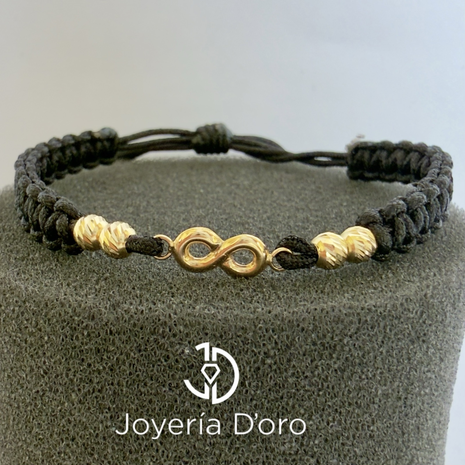 PULSERA TEJIDA NEGRA INFINITO CON 4 BOLAS #4 / 0.66GR / ORO AMARILLO 18K - imagen 1