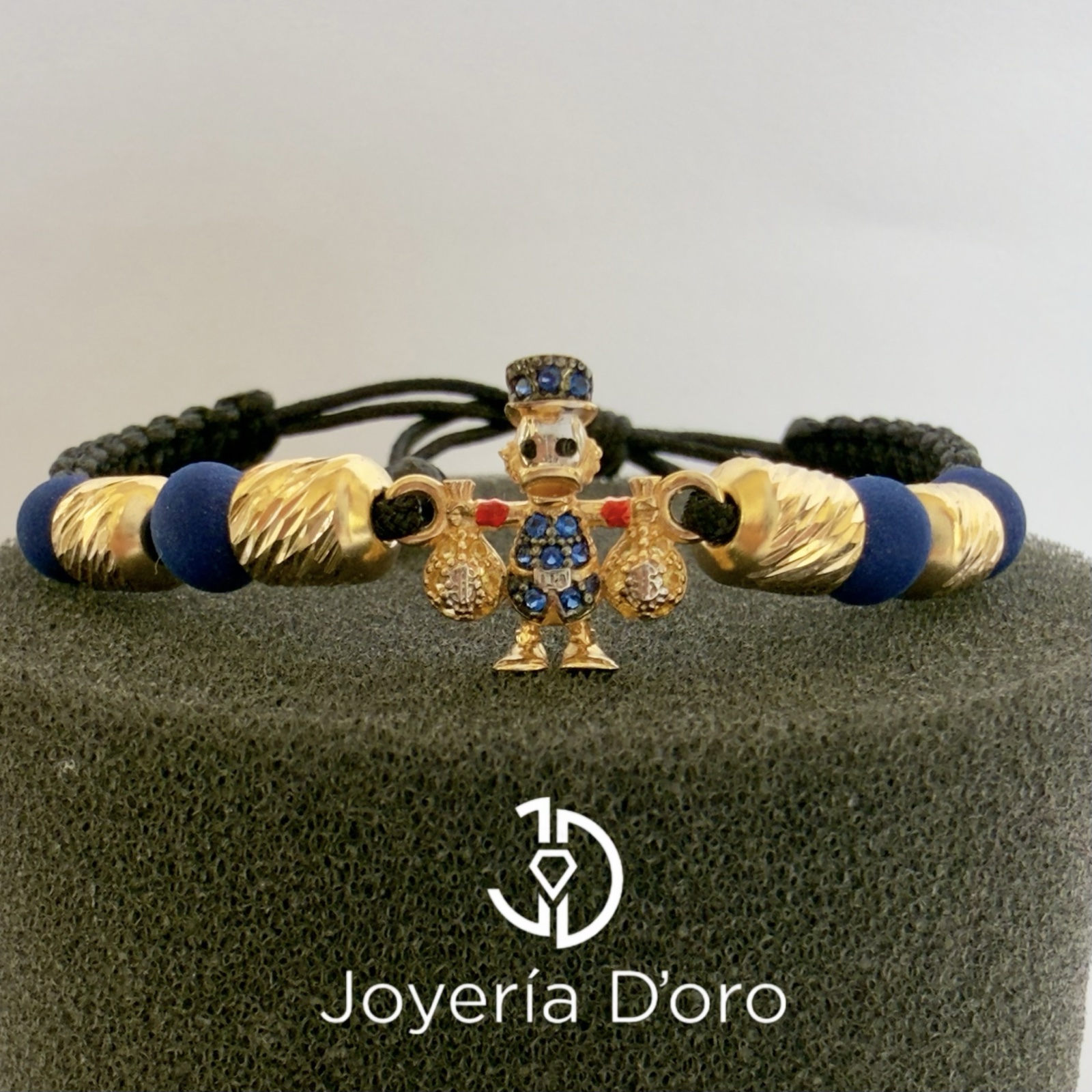 PULSERA TEJIDA PATO MILLONARIO CON 4 CILINDROS / 2.69GR / ORO AMARILLO 18K - imagen 1
