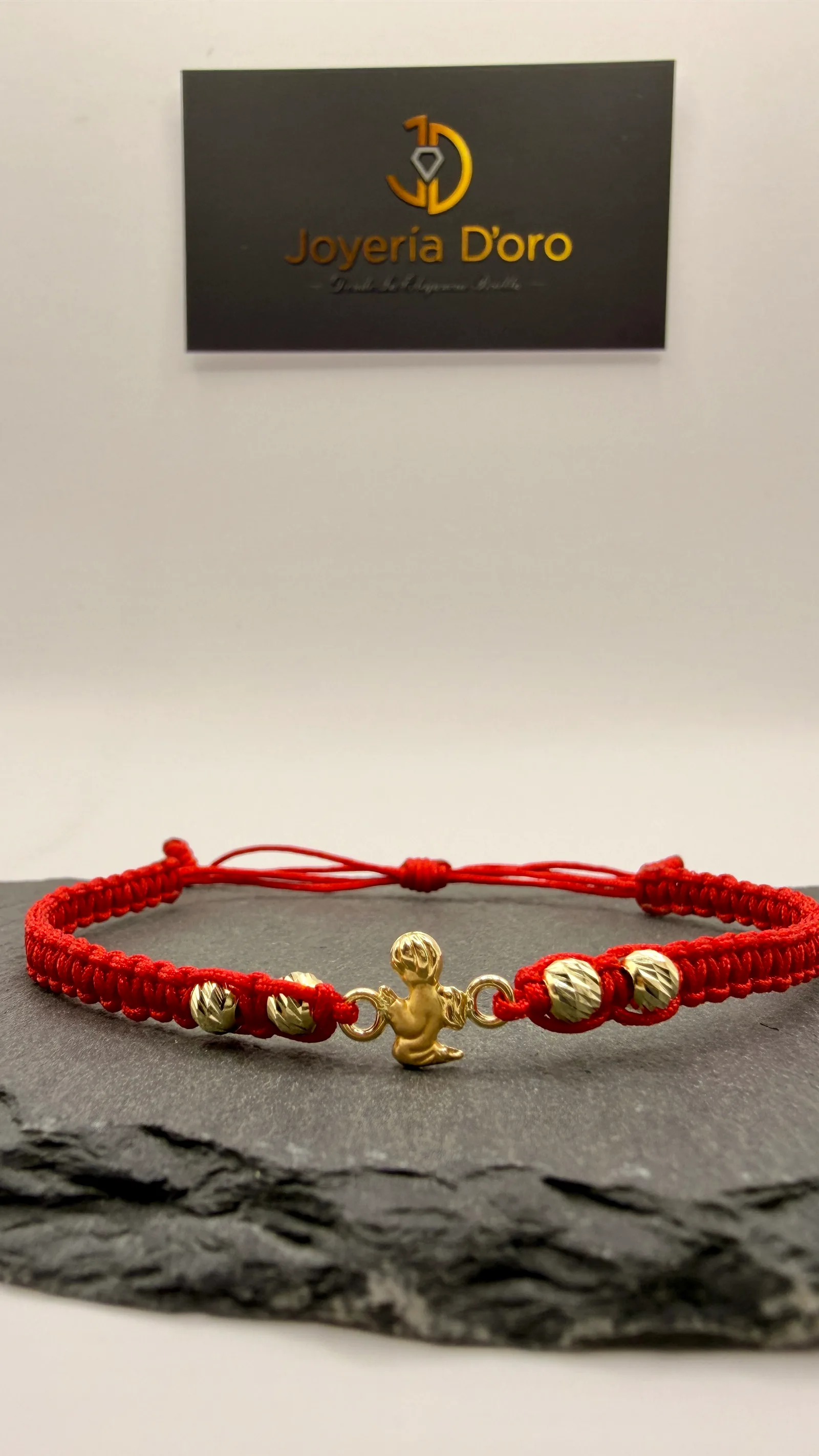PULSERA TEJIDA ROJA ANGEL CON BOLAS / 0.65GR / ORO AMARILLO 18K