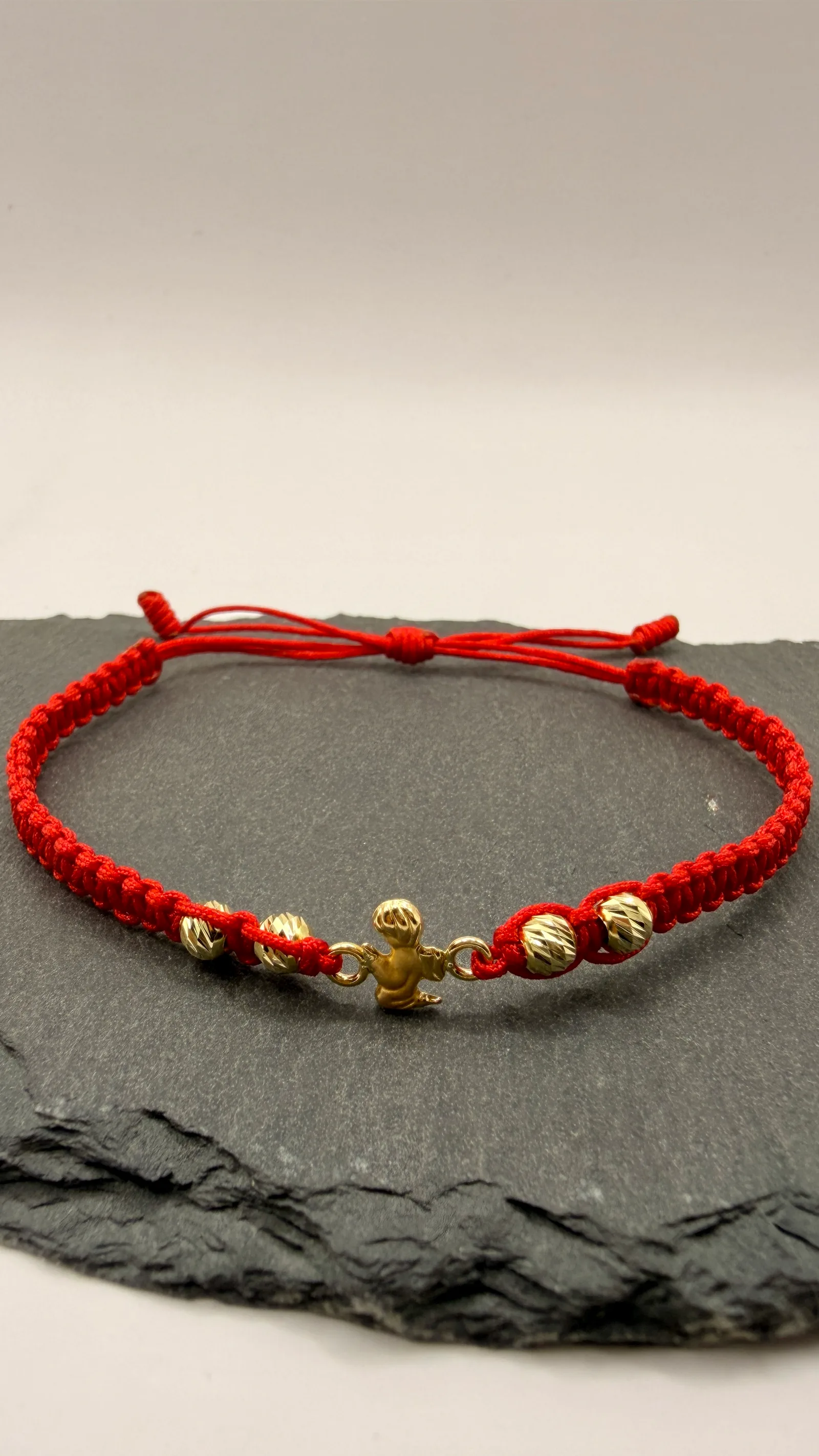 PULSERA TEJIDA ROJA ANGEL CON BOLAS / 0.65GR / ORO AMARILLO 18K - miniatura 3