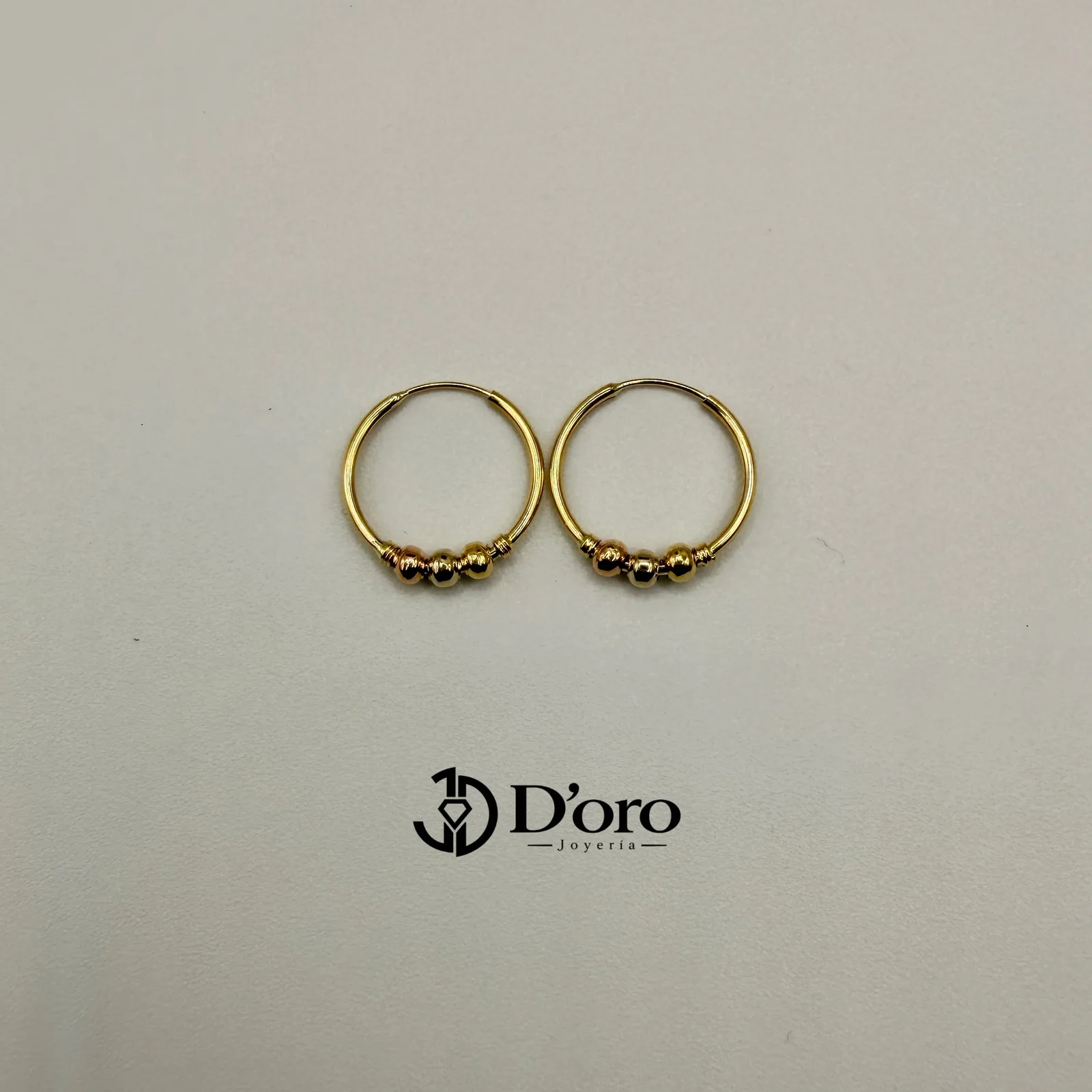 ARETE CANDONGA CON BOLAS / 1.33GR / ORO AMARILLO 18K